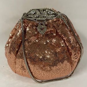 Small rose gold sequin evening pouch with handle